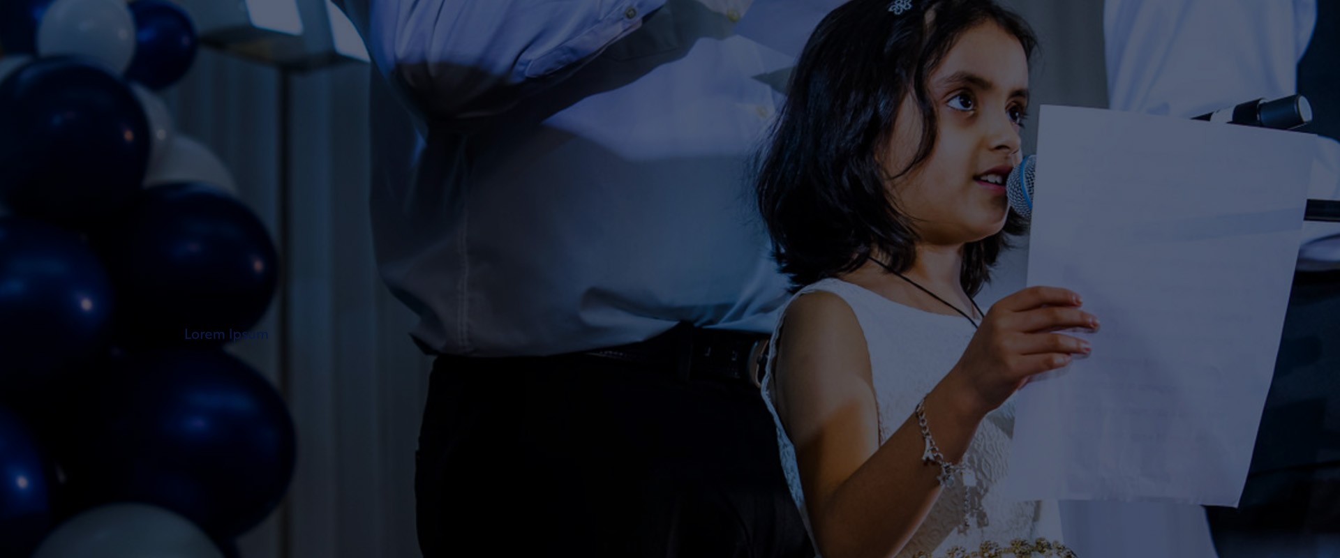 young girl standing in front of the mic about to sing