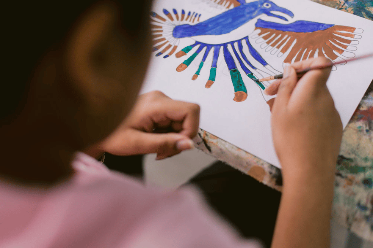 artist painting a bird