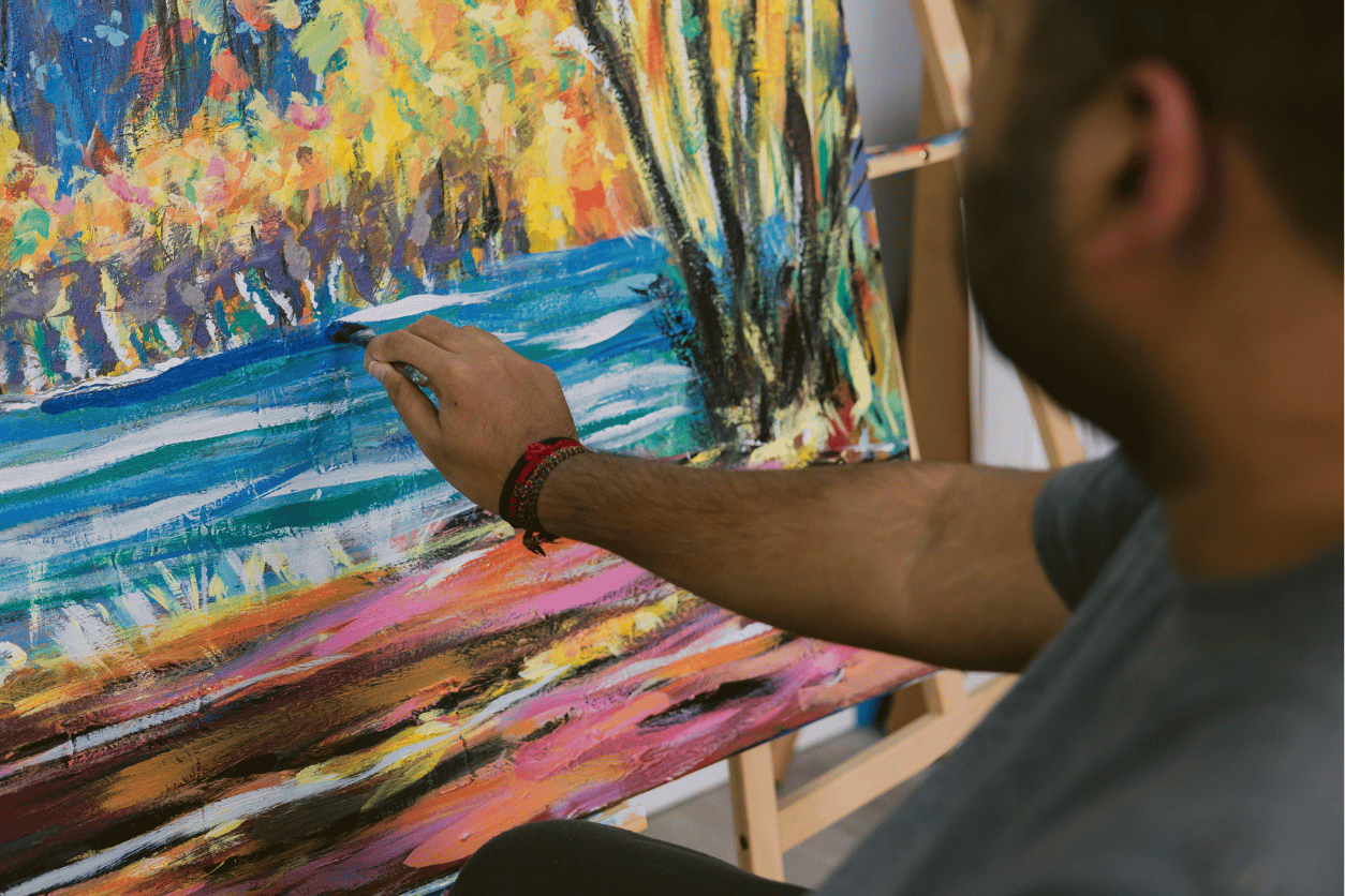 artist painting landscape scene